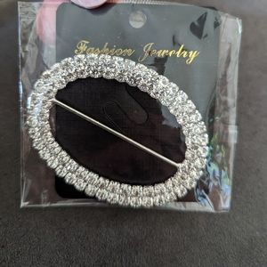 Silver jeweled belt buckle